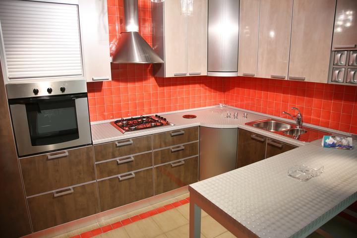 Modern kitchen with red tile backsplash