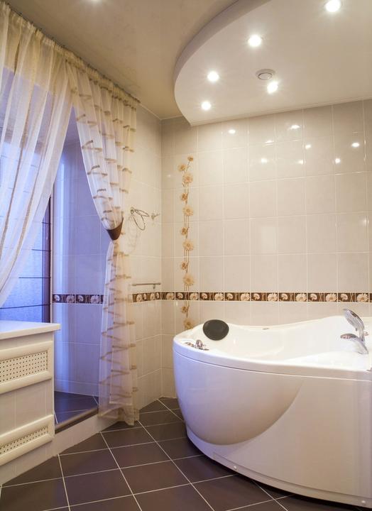 Bathroom with corner bathtub